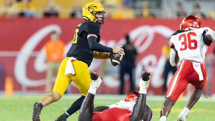 Oct 25, 2025; Tempe, Arizona, USA; Arizona State Sun Devils quarterback Sam Leavitt (10) scrambles against the Houston Cougars in the second half at Mountain America Stadium. Mandatory Credit: Mark J. Rebilas-Imagn Images