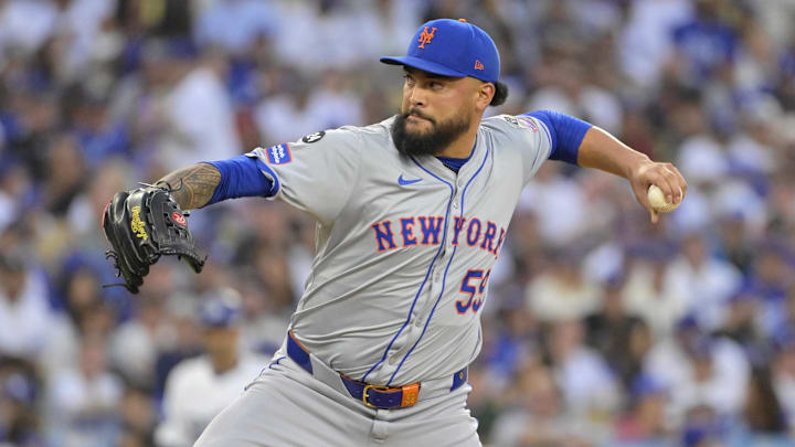 New York Mets pitcher Sean Manaea (59) pitches against the Los Angeles Dodgers in the second inning during game six of the NLCS for the 2024 MLB playoffs at Dodger Stadium. 