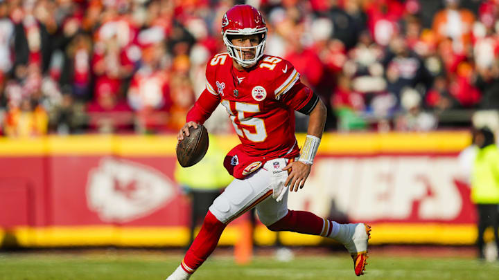 Dec 21, 2024; Kansas City, Missouri, USA; Kansas City Chiefs quarterback Patrick Mahomes (15) rolls out to pass during the first half against the Houston Texans at GEHA Field at Arrowhead Stadium. Mandatory Credit: Jay Biggerstaff-Imagn Images Dec 21, 2024; Kansas City, Missouri, USA; Kansas City Chiefs quarterback Patrick Mahomes (15) rolls out to pass during the first half against the Houston Texans at GEHA Field at Arrowhead Stadium. Mandatory Credit: Jay Biggerstaff-Imagn Images