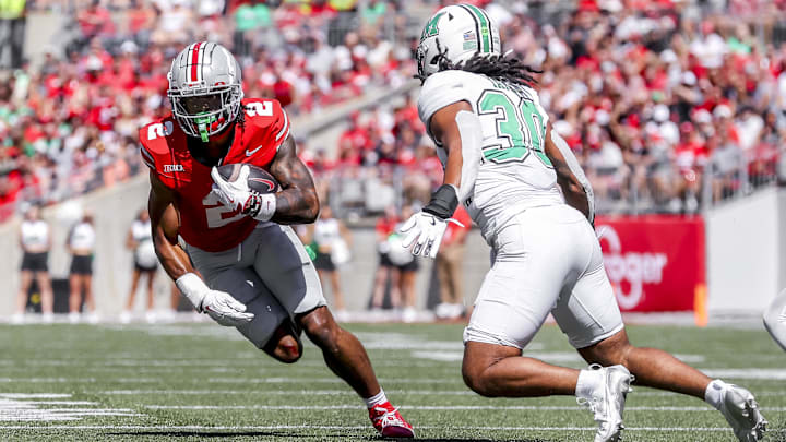 Sep 21, 2024; Columbus, Ohio, USA; Ohio State Buckeyes wide receiver Emeka Egbuka (2) runs the ball during the second quarter against the Marshall Thundering Herd at Ohio Stadium.