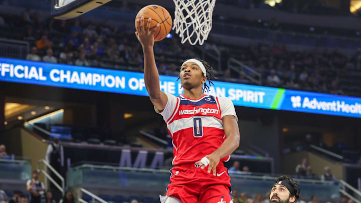 Nov 10, 2024; Orlando, Florida, USA; Washington Wizards guard Bilal Coulibaly (0) lays up during the first quarter against the Orlando Magic at Kia Center. Mandatory Credit: Mike Watters-Imagn Images