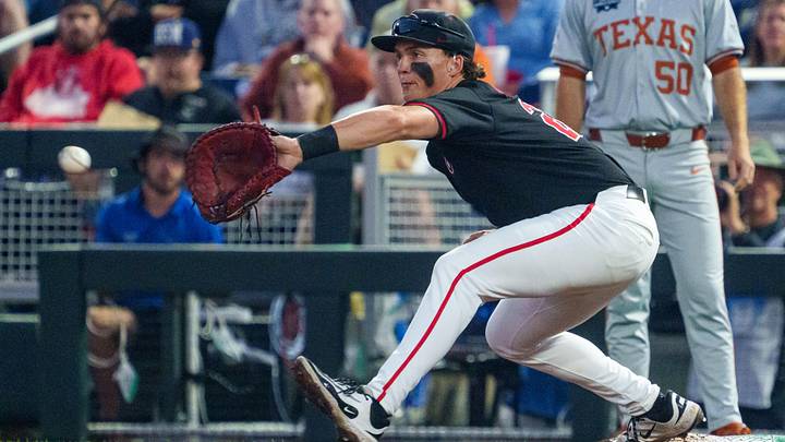 Jun 13, 2026; Omaha, NE, USA; Georgia Bulldogs first baseman Brennan Hudson (28) catches for an out at first on a double play against the Texas Longhorns during the fifth inning at Charles Schwab Field. Mandatory Credit: Dylan Widger-Imagn Images Jun 13, 2026; Omaha, NE, USA; Georgia Bulldogs first baseman Brennan Hudson (28) catches for an out at first on a double play against the Texas Longhorns during the fifth inning at Charles Schwab Field. Mandatory Credit: Dylan Widger-Imagn Images