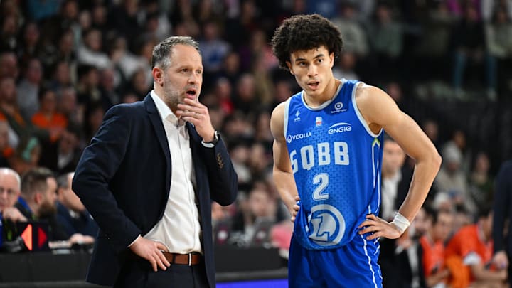 [US, Mexico & Canada customers only] Feb 15, 2025 Caen, FRANCE; St Quentin point guard Nolan Traore with coach Julien Mahe against Le Mans in a Leaders Cup match. Mandatory Credit: Franck Faugere/Presse Sports via Imagn Images