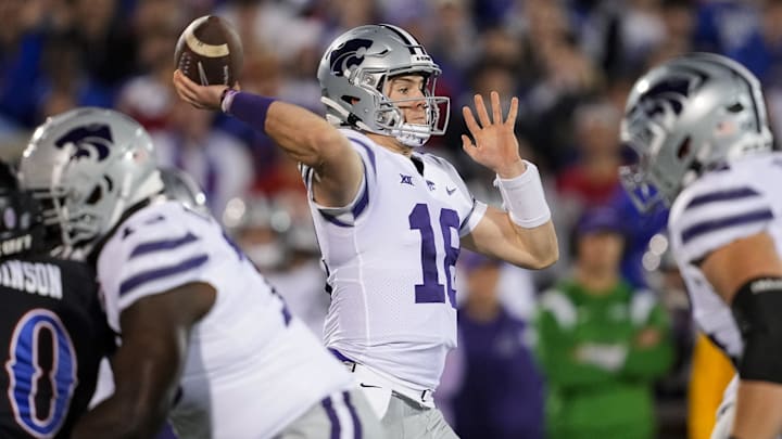 Nov 18, 2023; Lawrence, Kansas, USA; Kansas State Wildcats quarterback Will Howard (18) throws a pass against the Kansas Jayhawks.