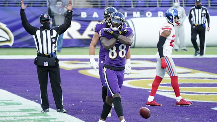 Dec 27, 2020; Baltimore, Maryland, USA; Baltimore Ravens  wide receiver Dez Bryant (88) reacts following his fourth quarter touchdown catch against the New York Giants at M&T Bank Stadium. Mandatory Credit: Mitch Stringer-Imagn Images