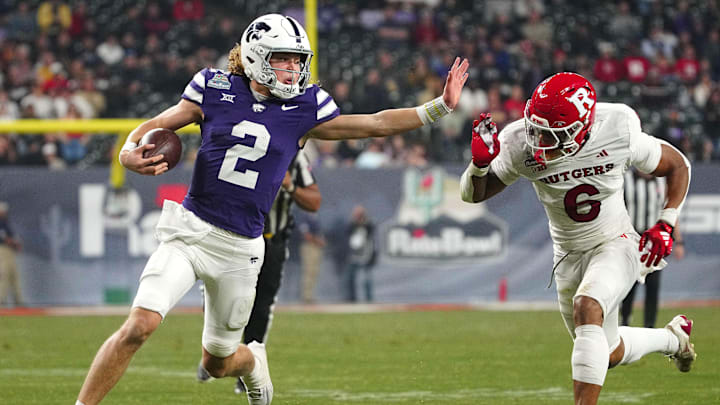 Kansas State quarterback Avery Johnson (2) scrambles against Rutgers during the second half of the Rate Bowl at Chase Field on Dec. 26, 2024, in Phoenix.