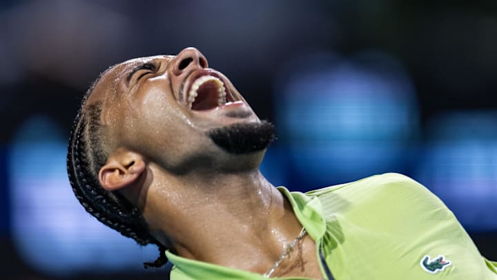 Arthur Fils reacts to a point