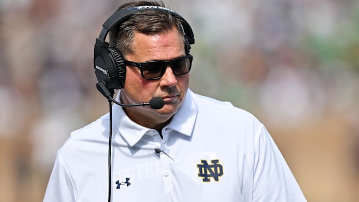 Sep 10, 2022; South Bend, Indiana, USA; Notre Dame Fighting Irish defensive coordinator Al Golden watches in the first quarter against the Marshall Thundering Herd at Notre Dame Stadium. Mandatory Credit: Matt Cashore-Imagn Images Sep 10, 2022; South Bend, Indiana, USA; Notre Dame Fighting Irish defensive coordinator Al Golden watches in the first quarter against the Marshall Thundering Herd at Notre Dame Stadium. Mandatory Credit: Matt Cashore-Imagn Images