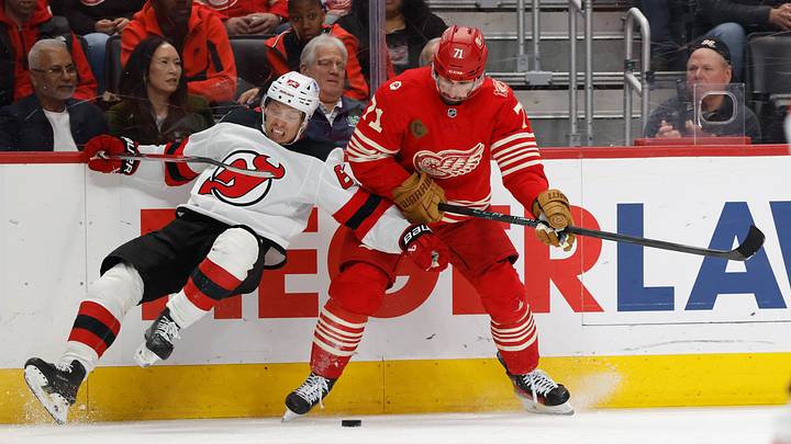 Apr 11, 2026; Detroit, Michigan, USA; Detroit Red Wings center Dylan Larkin (71) and New Jersey Devils left wing Jesper Bratt (63) battle for the puck in the second period at Little Caesars Arena. Mandatory Credit: Rick Osentoski-Imagn Images Apr 11, 2026; Detroit, Michigan, USA; Detroit Red Wings center Dylan Larkin (71) and New Jersey Devils left wing Jesper Bratt (63) battle for the puck in the second period at Little Caesars Arena. Mandatory Credit: Rick Osentoski-Imagn Images