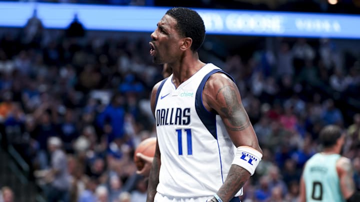 Feb 27, 2025; Dallas, Texas, USA;  Dallas Mavericks guard Kyrie Irving (11) reacts after scoring against the Charlotte Hornets during the second half at American Airlines Center. Mandatory Credit: Kevin Jairaj-Imagn Images