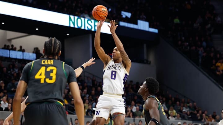 Bryson Tucker (8) scores a mid-range basket against the Baylor Bears before leaving with an ankle injury. 