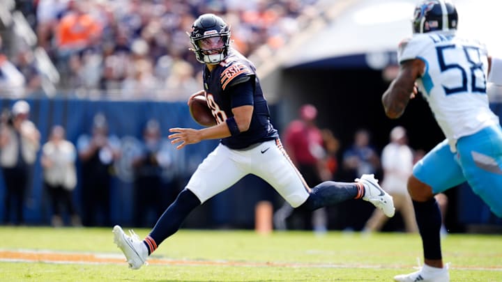 Chicago Bears quarterback Caleb Williams (18) is pressured by Tennessee Titans linebacker Harold Landry III (58) during the fourth quarter at Soldier Field in Chicago, Ill., Sunday, Sept. 8, 2024.