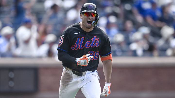Mets center fielder Tyrone Taylor (28) reacts after hitting a three-run home run against the Dodgers. 