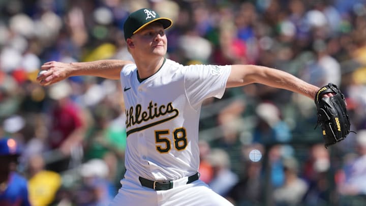 Apr 13, 2025; West Sacramento, California, USA; Athletics pitcher Noah Murdock (58) throws a pitch against the New York Mets during the seventh inning at Sutter Health Park. Mandatory Credit: Darren Yamashita-Imagn Images
