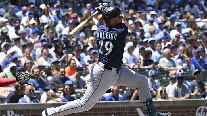  Seattle Mariners catcher Cal Raleigh hits a home run during a game against the Chicago Cubs on June 20 at Wrigley Field.