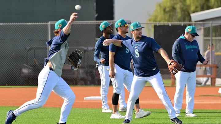 Feb 12, 2026; Peoria, AZ, USA; Seattle Mariners players warm up during a Spring Training workout at Peoria Sports Complex. Mandatory Credit: Matt Kartozian-Imagn Images Feb 12, 2026; Peoria, AZ, USA; Seattle Mariners players warm up during a Spring Training workout at Peoria Sports Complex. Mandatory Credit: Matt Kartozian-Imagn Images