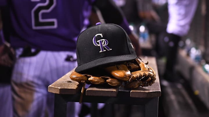 Denver, CO, USA; General view of the hat and glove of Colorado Rockies shortstop Pat Valaika (4) (not pictured) in the seventh inning against the Philadelphia Phillies at Coors Field.