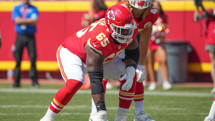 Aug 17, 2024; Kansas City, Missouri, USA; Kansas City Chiefs guard Trey Smith (65) on the line of scrimmage against the Detroit Lions during the game at GEHA Field at Arrowhead Stadium. Mandatory Credit: Denny Medley-Imagn Images