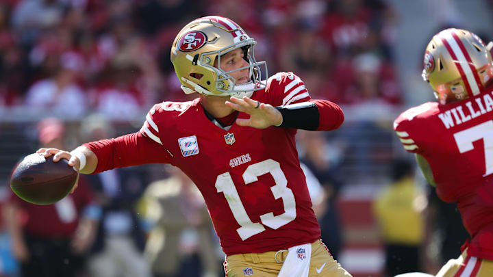 Sep 29, 2024; Santa Clara, California, USA; San Francisco 49ers quarterback Brock Purdy (13) throws a pass against the New England Patriots during the third quarter at Levi's Stadium. Mandatory Credit: Sergio Estrada-Imagn Images