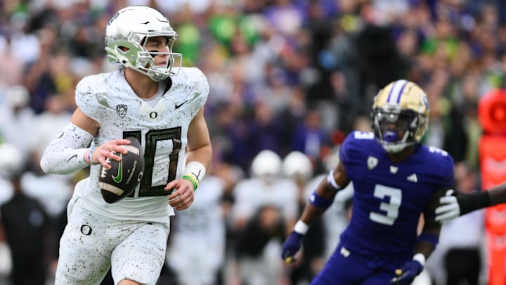 Oct 14, 2023; Seattle, Washington, USA; Oregon Ducks quarterback Bo Nix (10) looks to pass the ball