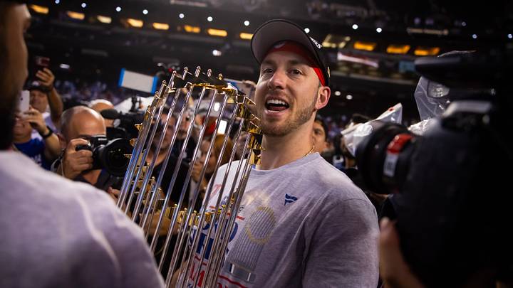 Nov 1, 2023; Phoenix, Arizona, USA; Texas Rangers designated hitter Mitch Garver celebrates with the trophy after defeating the Arizona Diamondbacks in game five of the 2023 World Series at Chase Field. Mandatory Credit: Mark J. Rebilas-USA TODAY Sports Nov 1, 2023; Phoenix, Arizona, USA; Texas Rangers designated hitter Mitch Garver celebrates with the trophy after defeating the Arizona Diamondbacks in game five of the 2023 World Series at Chase Field. Mandatory Credit: Mark J. Rebilas-USA TODAY Sports