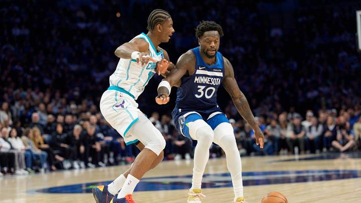 Minnesota Timberwolves forward Julius Randle (30) is defended by Charlotte Hornets forward Moussa Diabate Minnesota Timberwolves forward Julius Randle (30) is defended by Charlotte Hornets forward Moussa Diabate