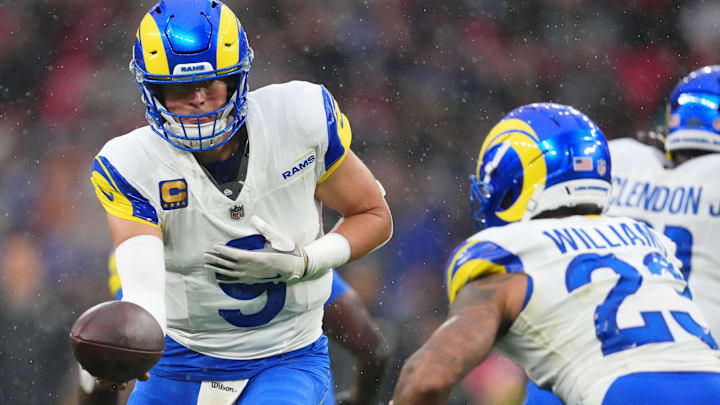 Oct 19, 2025; London, United Kingdom; Los Angeles Rams quarterback Matthew Stafford (9) hands the ball off to running back Kyren Williams (23) during the first half of an NFL International Series game at Wembley Stadium. Mandatory Credit: Kirby Lee-Imagn Images Oct 19, 2025; London, United Kingdom; Los Angeles Rams quarterback Matthew Stafford (9) hands the ball off to running back Kyren Williams (23) during the first half of an NFL International Series game at Wembley Stadium. Mandatory Credit: Kirby Lee-Imagn Images