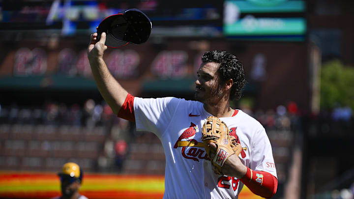 Sep 21, 2025; St. Louis, Missouri, USA; St. Louis Cardinals third baseman Nolan Arenado (28) salutes the fans after he was ceremonially removed before the start of the first inning against the Milwaukee Brewers at Busch Stadium. Mandatory Credit: Jeff Curry-Imagn Images