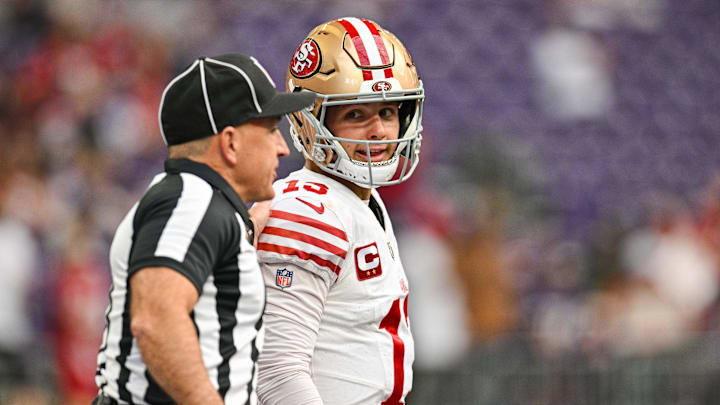 Sep 15, 2024; Minneapolis, Minnesota, USA; San Francisco 49ers quarterback Brock Purdy (13) talks with an official before the game against the Minnesota Vikings at U.S. Bank Stadium. Mandatory Credit: Jeffrey Becker-Imagn Images Sep 15, 2024; Minneapolis, Minnesota, USA; San Francisco 49ers quarterback Brock Purdy (13) talks with an official before the game against the Minnesota Vikings at U.S. Bank Stadium. Mandatory Credit: Jeffrey Becker-Imagn Images