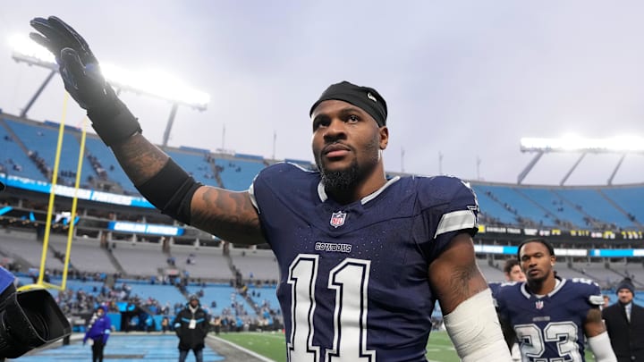 Dallas Cowboys linebacker Micah Parsons walks off the field after the game at Bank of America Stadium. 