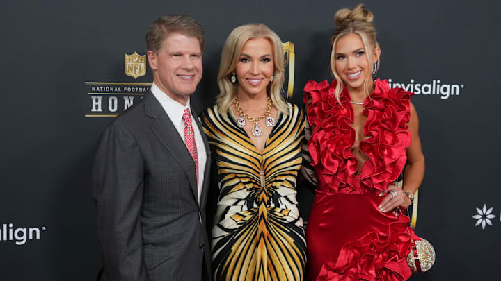 Kansas City Chiefs owner Clark Hunt with his wife Tavia Shackles, and daughter Gracie Hunt on the red carpet before Super Bowl LIX NFL Honors.
