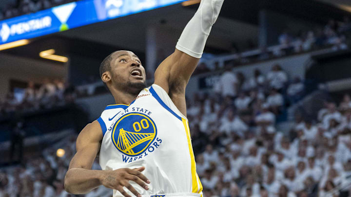 May 14, 2025; Minneapolis, Minnesota, USA; Golden State Warriors forward Jonathan Kuminga (00) drives to the basket against the Minnesota Timberwolves in the second half during game five of the second round for the 2025 NBA Playoffs at Target Center. Mandatory Credit: Jesse Johnson-Imagn Images