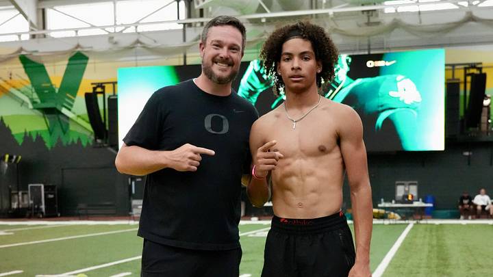 Jayden Thomas with Oregon head coach Dan Lanning after a workout with the Ducks.