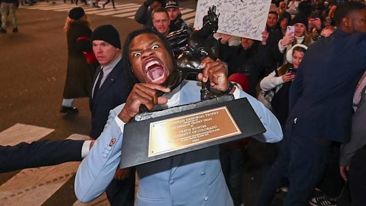 Colorado Buffaloes wide receiver/cornerback Travis Hunter after winning the 2024 Heisman Trophy