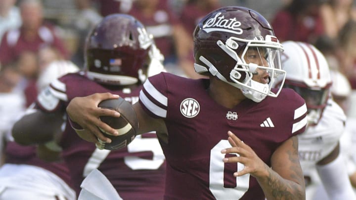 Nov 2, 2024; Starkville, Mississippi, USA; Mississippi State Bulldogs quarterback Michael Van Buren Jr. (0) runs the ball against the Massachusetts Minutemen during the first quarter at Davis Wade Stadium at Scott Field. Mandatory Credit: Matt Bush-Imagn Images
