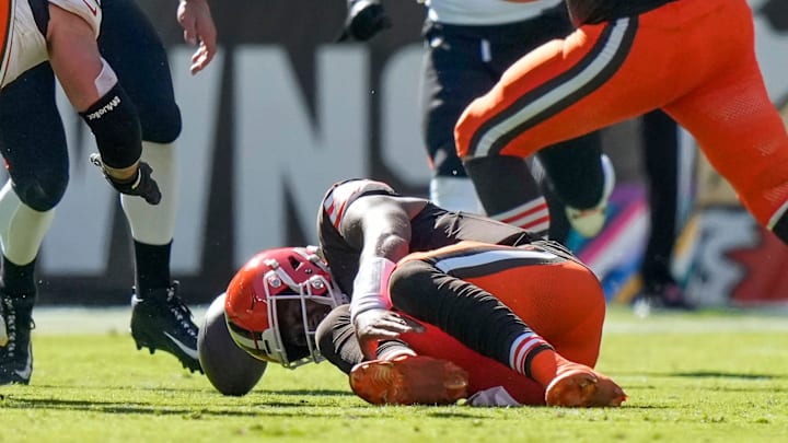 Cleveland Browns quarterback Deshaun Watson (4) goes down with a non-contact injury to his lower leg in the second quarter of the NFL Week 7 game between the Cleveland Browns and the Cincinnati Bengals at Huntington Bank Field in downtown Cleveland on Sunday, Oct. 20, 2024.