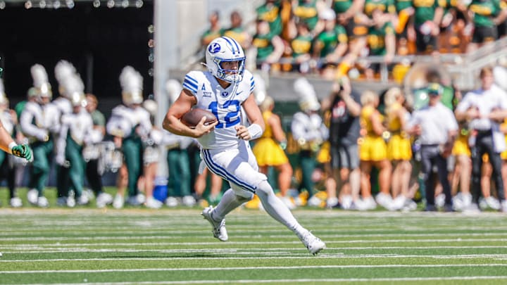 BYU quarterback Jake Retzlaff runs against Baylor BYU quarterback Jake Retzlaff runs against Baylor