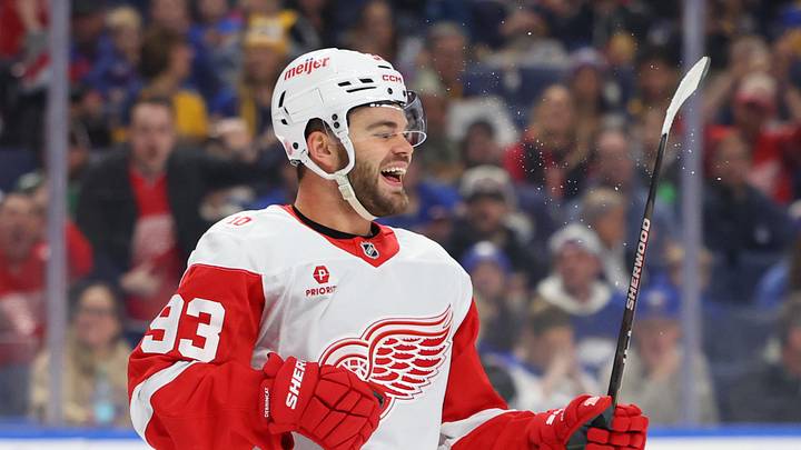 Mar 27, 2026; Buffalo, New York, USA;  Detroit Red Wings right wing Alex DeBrincat (93) reacts after scoring a goal during the first period against the Buffalo Sabres at KeyBank Center. Mandatory Credit: Timothy T. Ludwig-Imagn Images