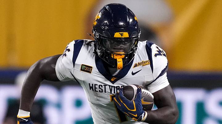 Sep 19, 2026; Charlotte, North Carolina, USA; West Virginia Mountaineers running back Amari Latimer (1) runs for yards after catch against the Virginia Cavaliers during the second quarter at Bank of America Stadium. Mandatory Credit: Jim Dedmon-Imagn Images Sep 19, 2026; Charlotte, North Carolina, USA; West Virginia Mountaineers running back Amari Latimer (1) runs for yards after catch against the Virginia Cavaliers during the second quarter at Bank of America Stadium. Mandatory Credit: Jim Dedmon-Imagn Images
