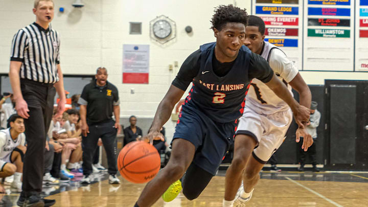 East Lansing senior Kelvin Torbert (2) drives to the basket against Waverly in prep action Friday, Feb. 6, 2026 at Waverly.