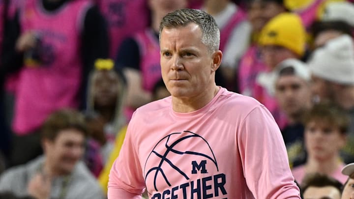 Feb 5, 2025; Ann Arbor, Michigan, USA;  Michigan Wolverines head coach Dusty May watches from the bench during the first quarter of their game against the Oregon Ducks at Crisler Center. Mandatory Credit: Lon Horwedel-Imagn Images