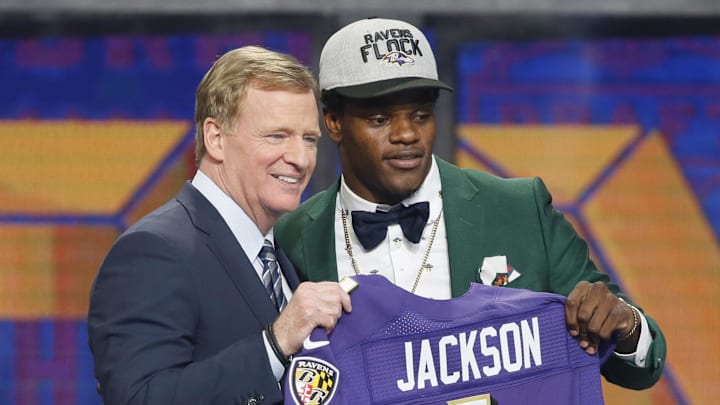 Apr 26, 2018; Arlington, TX, USA; Lamar Jackson (Louisville) with NFL commissioner Roger Goodell after being selected as the number thirty-two overall pick to the Baltimore Ravens in the first round of the 2018 NFL Draft at AT&T Stadium. Mandatory Credit: Tim Heitman-Imagn Images Apr 26, 2018; Arlington, TX, USA; Lamar Jackson (Louisville) with NFL commissioner Roger Goodell after being selected as the number thirty-two overall pick to the Baltimore Ravens in the first round of the 2018 NFL Draft at AT&T Stadium. Mandatory Credit: Tim Heitman-Imagn Images