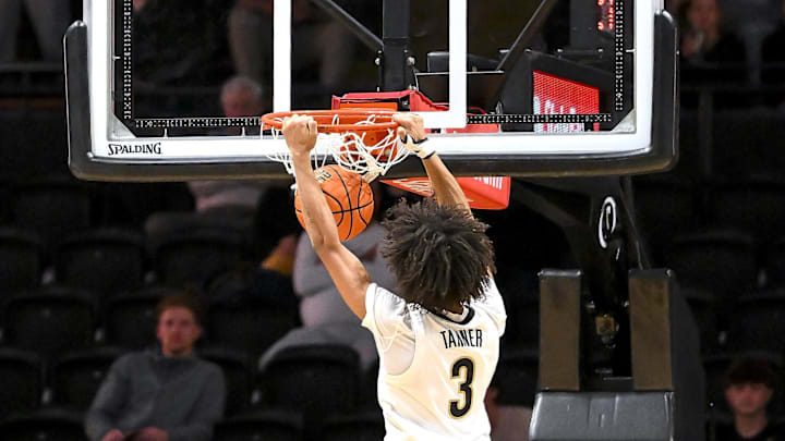 Nov 3, 2025; Nashville, Tennessee, USA;  Vanderbilt Commodores guard Tyler Tanner (3) dunks the ball against the Lipscomb Bisons during the first half at Memorial Gymnasium. Mandatory Credit: Steve Roberts-Imagn Images