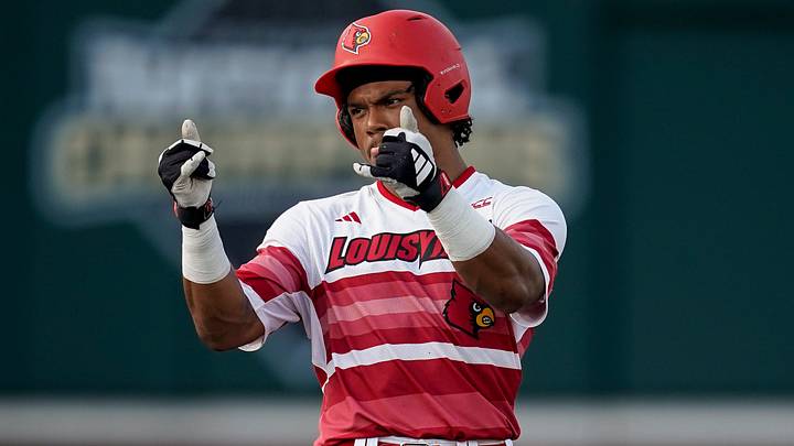 Louisville designated hitter Zion Rose (32) celebrates his RBI-double against Vanderbilt during the first inning at Hawkins Field in Nashville, Tenn., Tuesday, May 7, 2024. Louisville designated hitter Zion Rose (32) celebrates his RBI-double against Vanderbilt during the first inning at Hawkins Field in Nashville, Tenn., Tuesday, May 7, 2024.