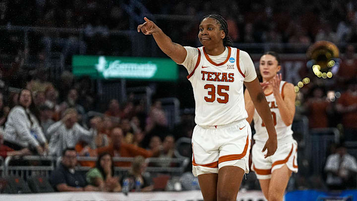 Texas forward Madison Booker celebrates a score during the game against Alabama.