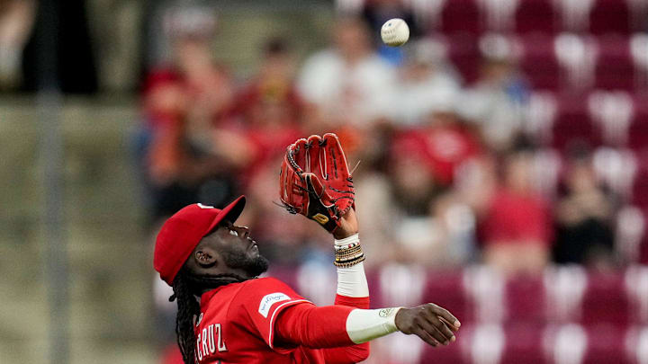Cincinnati Reds shortstop Elly de la Cruz (44) catches a pop up off the bat of Mickey Moniak in the ninth inning of the MLB National League game between the Cincinnati Reds and the Colorado Rockies at Great American Ball Park in downtown Cincinnati on Tuesday, April 28, 2026. The Reds won the opening game of the series, 7-2.