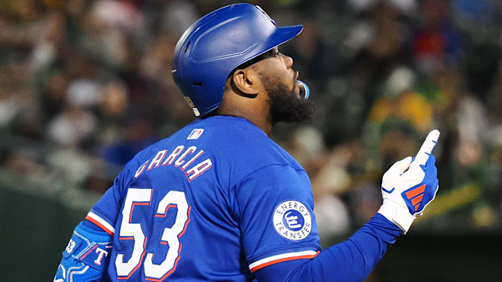 Sep 25, 2024; Oakland, California, USA; Texas Rangers right fielder Adolis Garcia (53) gestures after hitting a two-run home run against the Oakland Athletics during the third inning at Oakland-Alameda County Coliseum