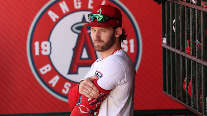 Sep 29, 2024; Anaheim, California, USA;  Los Angeles Angels left fielder Taylor Ward (3) stands in a dugout during the ninth inning against the Texas Rangers at Angel Stadium. Mandatory Credit: Kiyoshi Mio-Imagn Images