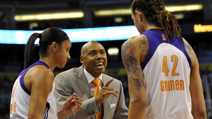 May 27, 2013; Phoenix, AZ, USA; Phoenix Mercury head coach Corey Gaines talks with forward Candice Dupree (4) and center Brittney Griner (42) during the second half against the Chicago Sky at US Airways Center. The Chicago Sky defeated the Phoenix Mercury 102-80. Mandatory Credit: Casey Sapio-Imagn Images