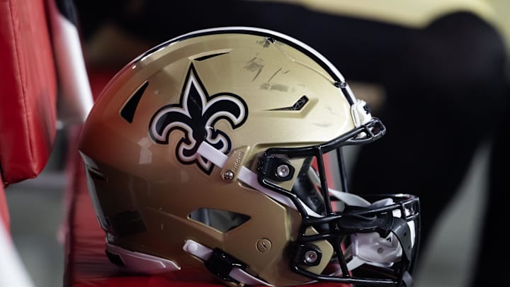 Aug 10, 2024; Glendale, Arizona, USA; Detailed view of a New Orleans Saints helmet during a preseason NFL game at State Farm Stadium. Mandatory Credit: Mark J. Rebilas-Imagn Images